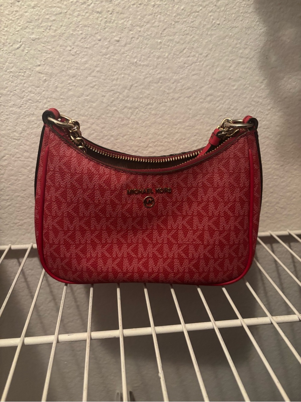 Michael kors red monogram shoulder bag . Willing to negotiate